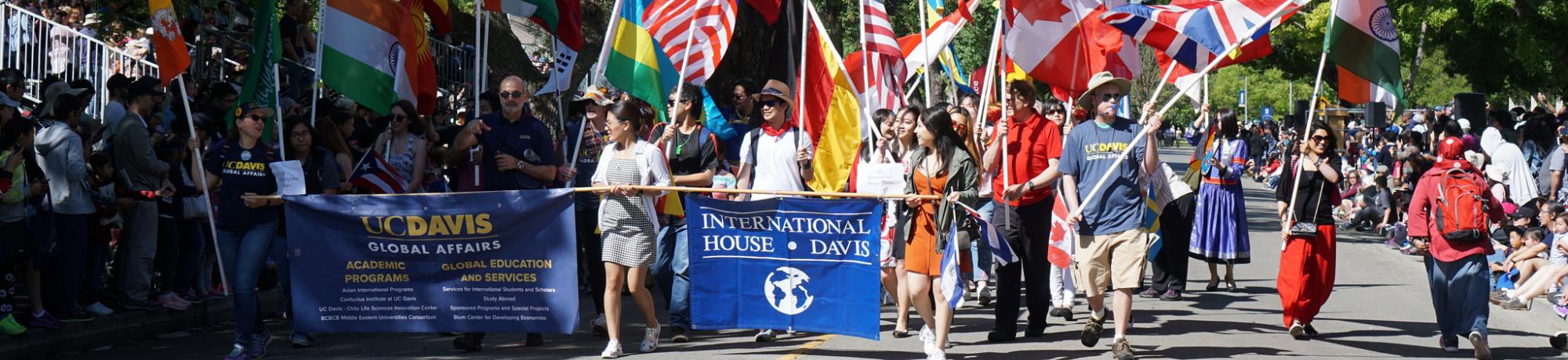 Global Affairs and International House lead march with world flags