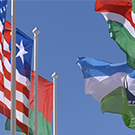 flags against a blue sky 