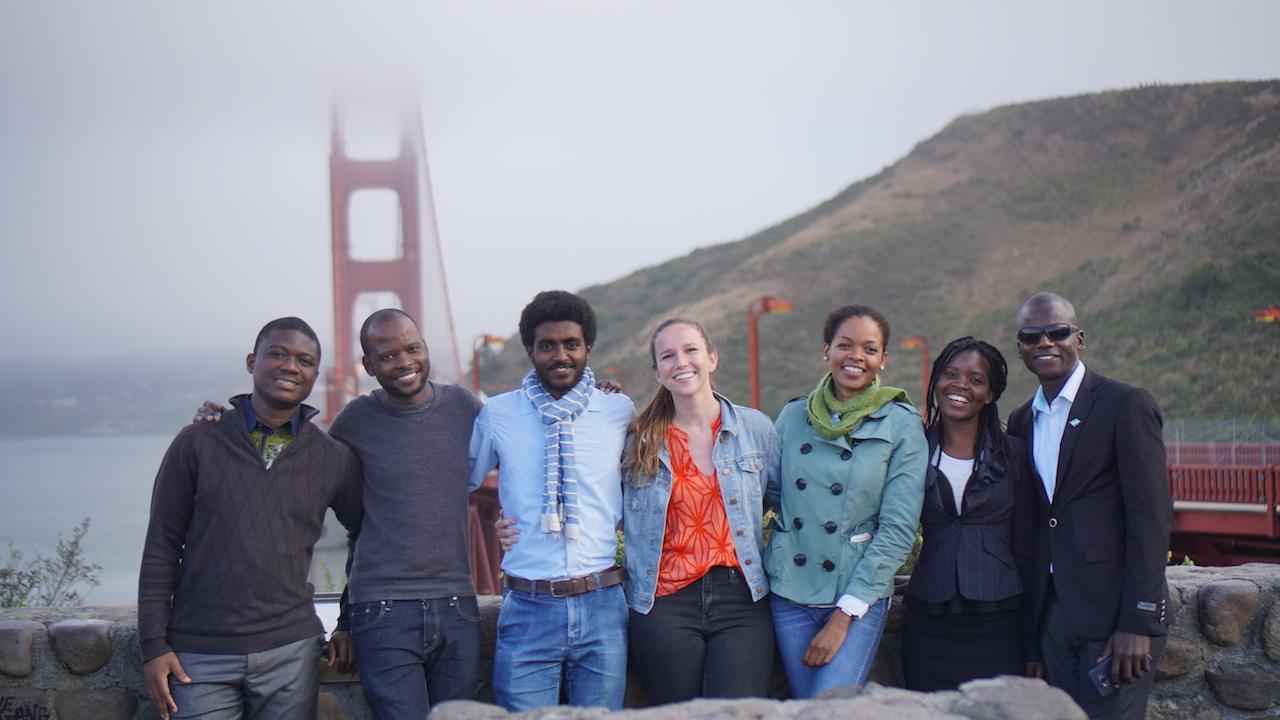 Tene Goodwin (third from right) with some of the 2018 UC Davis Mandela Washington Fellows at the Golden Gate Bridge in San Francisco following a site visit. Group of people standing in front of the golden gate bridge