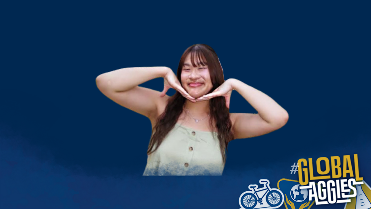 Global Aggies logo with Kiara smiling.