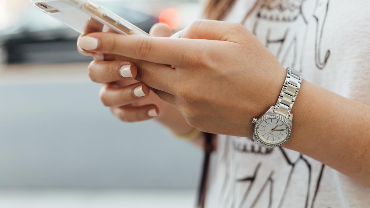 hands holding a mobile phone