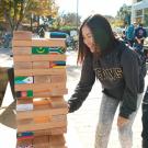 Students playing world Jenga