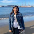 Photos of Shriya Jain on a beach.