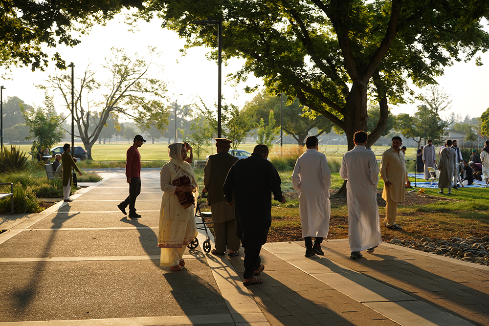 the backs of a group of people at the International Center