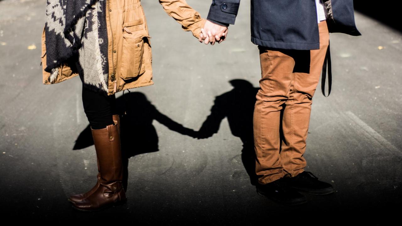 couple holding hands